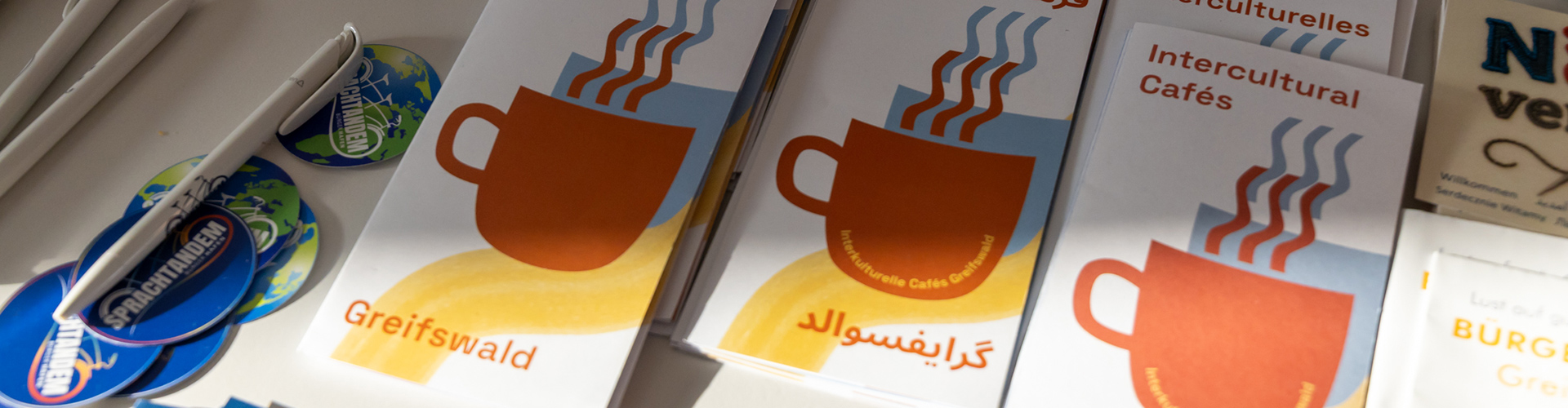 Infobroschüren zum Netzwerk Migration Greifswald