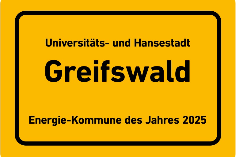 Ortseingangsschild mit der Aufschrift Greifswald Energie Kommune des Jahres